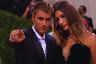"Shocking News: Hailey Bieber's Bump Revealed in Wedding Dress - Is This the Start of Bieber Baby Fever?"