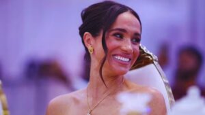 "Royal Shock: Meghan Markle's 'Megawatt' Smile Sparks Controversy on Nigeria Trip"