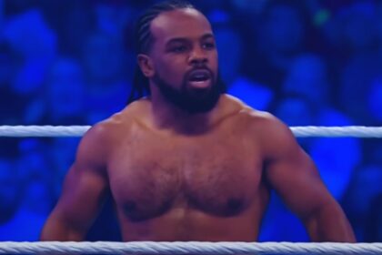"Xavier Woods Makes Shocking Comeback on WWE RAW Amidst Dark Warnings"